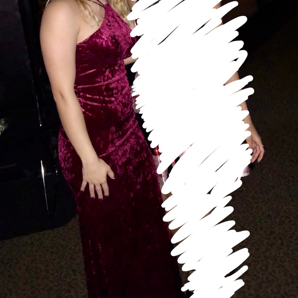 Red velvet Xscape prom dress- size 4 but stretchy (fits up to 8) only worn once